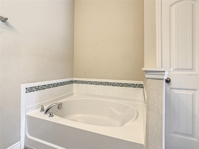 bathroom with a tub