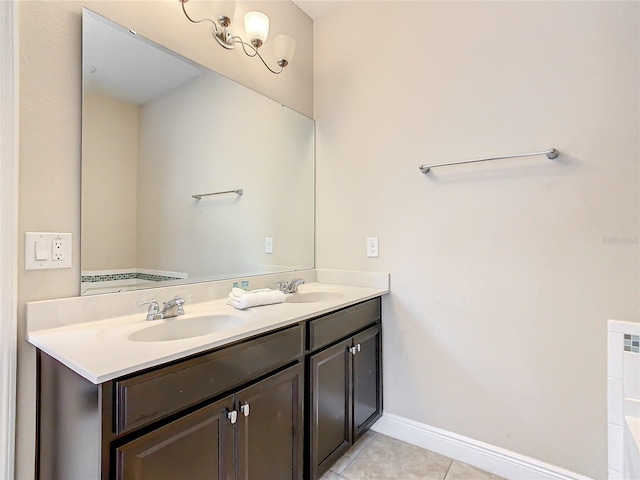 5303 Wildwood Way, Davenport, FL 33837 - full bathroom with double vanity and tile patterned floors