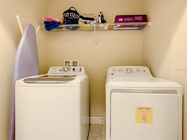 laundry area featuring separate washer and dryer