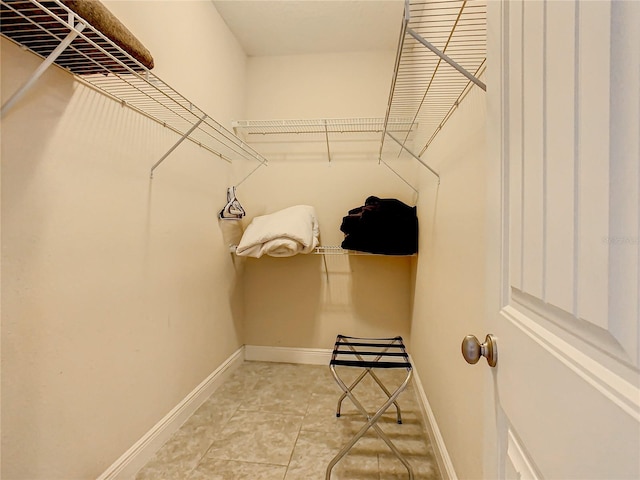 5303 Wildwood Way, Davenport, FL 33837 - spacious closet with light tile patterned flooring
