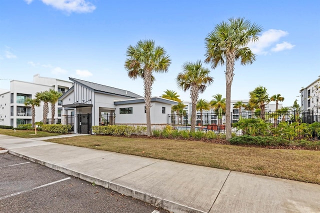 exterior space with a front lawn