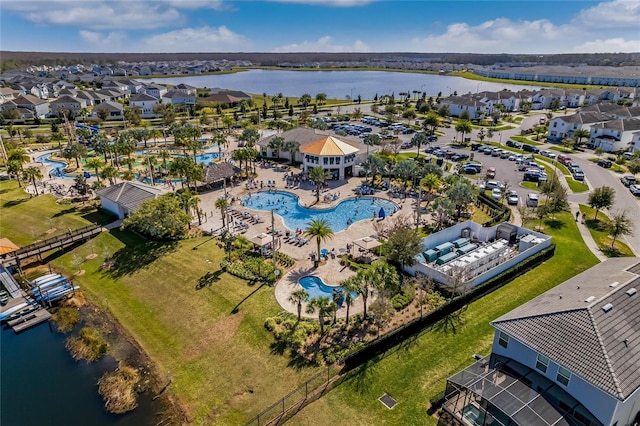 drone / aerial view with a water view