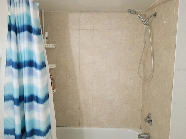 bathroom featuring shower / bath combination with curtain