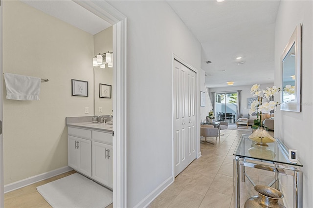 bathroom featuring vanity and tile patterned floors