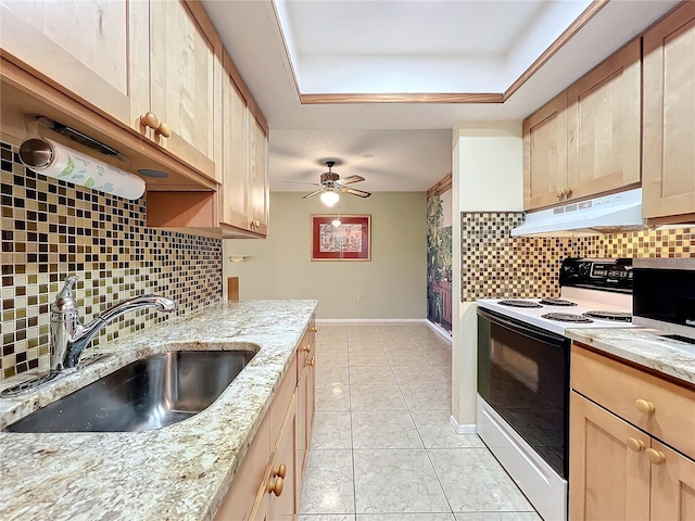 kitchen with white range with electric cooktop, decorative backsplash, sink, and light stone countertops