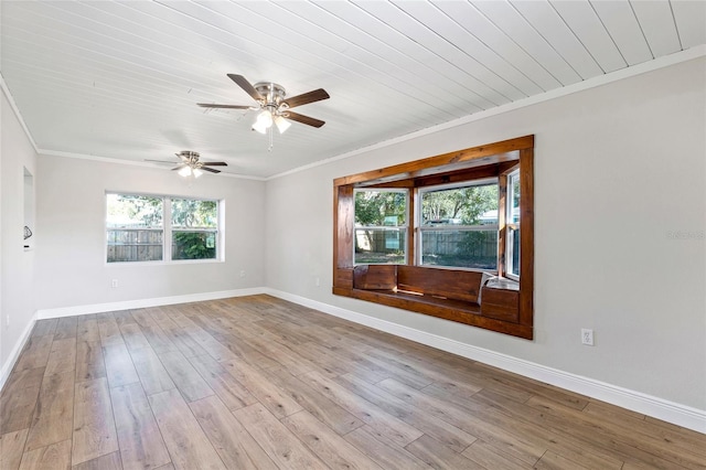 unfurnished room with wooden ceiling, light hardwood / wood-style floors, ceiling fan, and ornamental molding