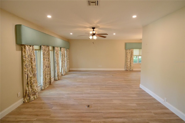 interior space with ceiling fan and light wood-type flooring