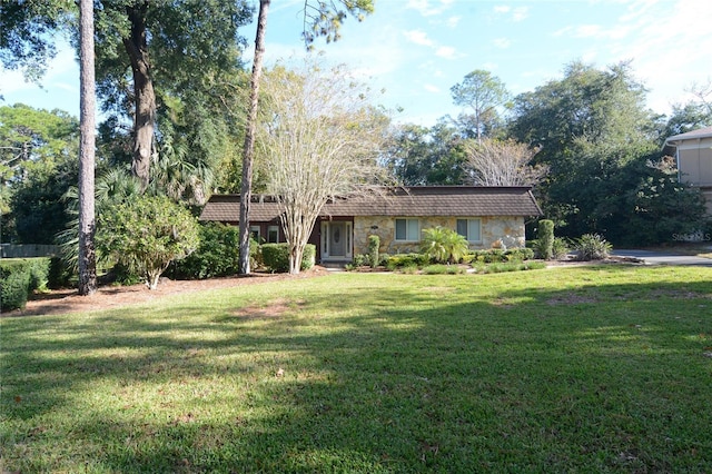 view of front of home with a front lawn