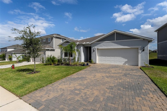 view of front facade featuring a garage and a front yard