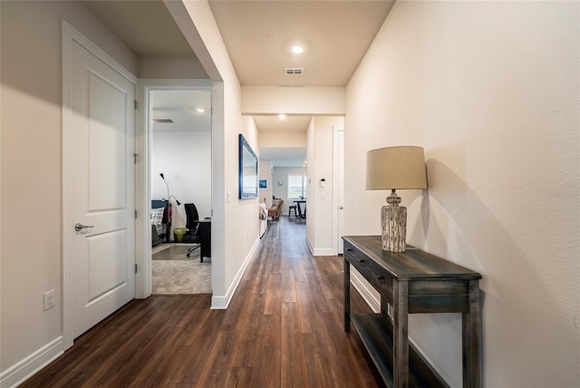 hall featuring dark hardwood / wood-style floors