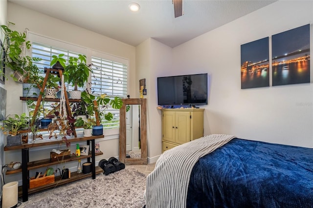 bedroom with carpet flooring and ceiling fan