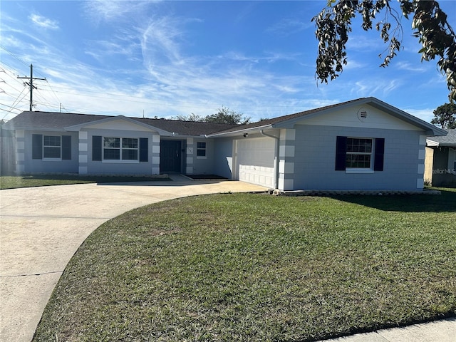 ranch-style home with a front lawn and a garage