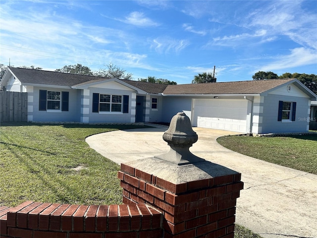 single story home featuring a front yard and a garage