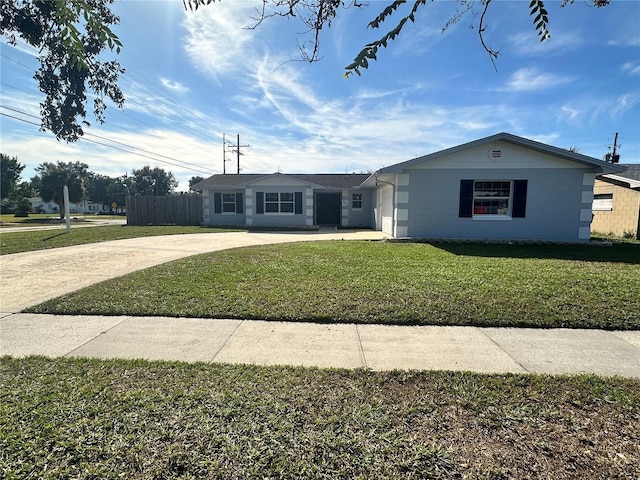 ranch-style house with a front yard