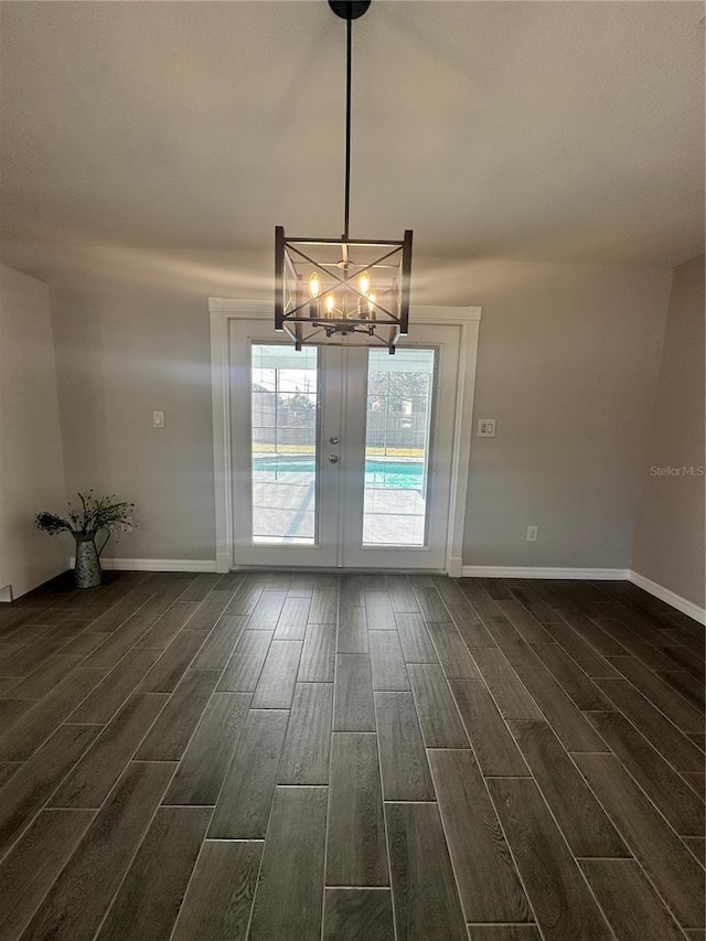 interior space with french doors and dark hardwood / wood-style floors