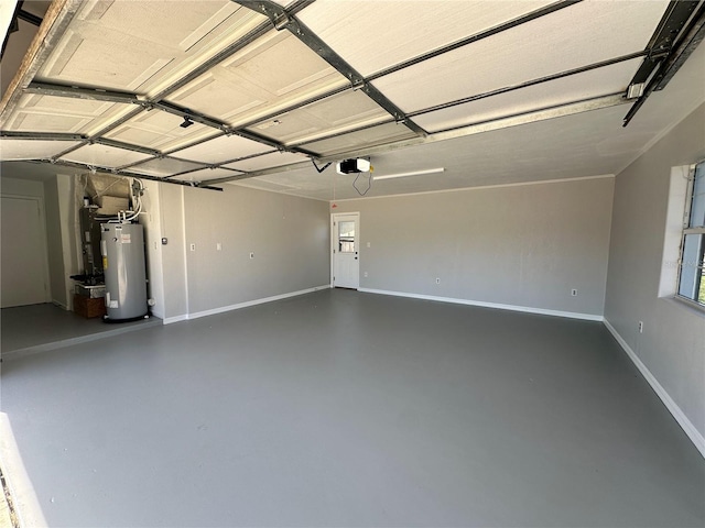 garage featuring a garage door opener and water heater