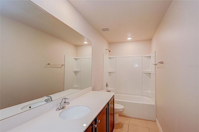 full bathroom featuring toilet, vanity, tile patterned floors, and shower / bathing tub combination