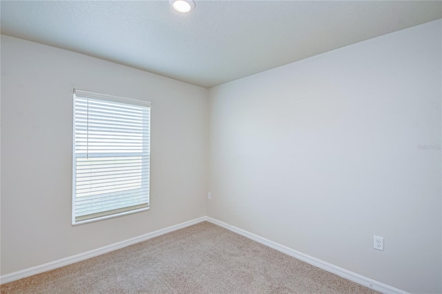 empty room with light carpet