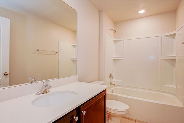 full bathroom with washtub / shower combination, tile patterned flooring, vanity, and toilet