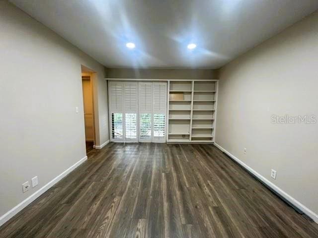 interior space with dark wood-type flooring