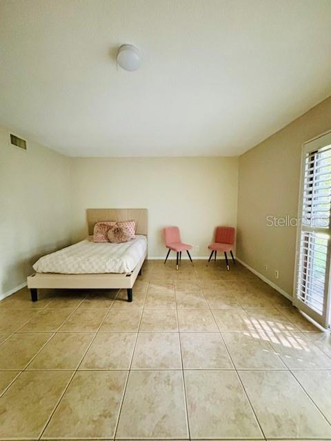 view of tiled bedroom