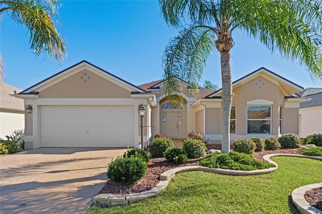 single story home with a garage and a front lawn