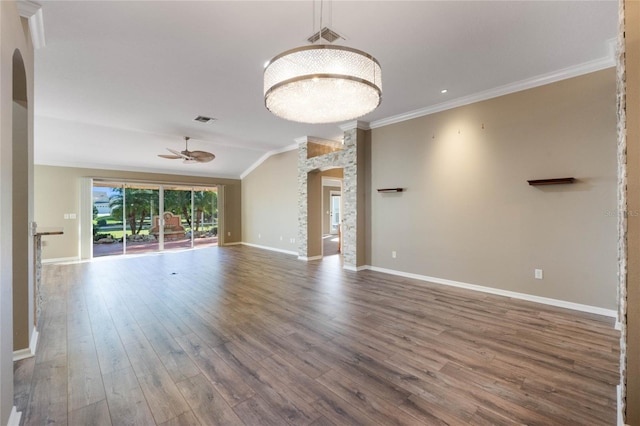 unfurnished living room featuring hardwood / wood-style floors, ceiling fan, lofted ceiling, and crown molding