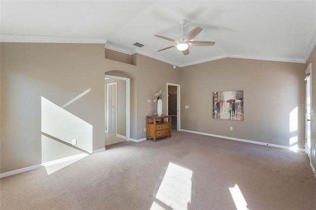 interior space featuring crown molding, light carpet, and vaulted ceiling