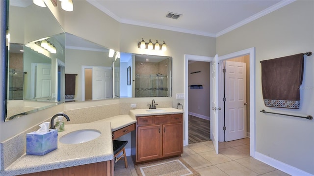 bathroom with tile patterned flooring, vanity, an enclosed shower, and ornamental molding