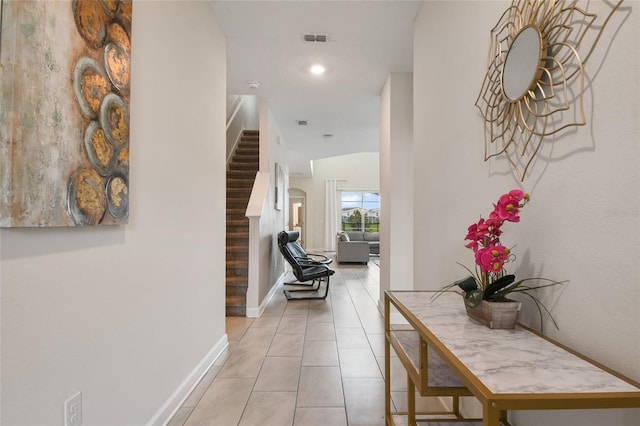 8942 Cabot Cliffs Dr, Davenport, FL 33896 - corridor with light tile patterned floors, stairway, and recessed lighting