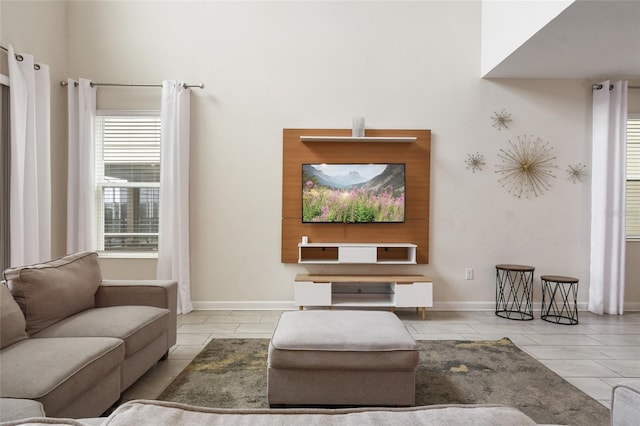 living room featuring light tile patterned flooring