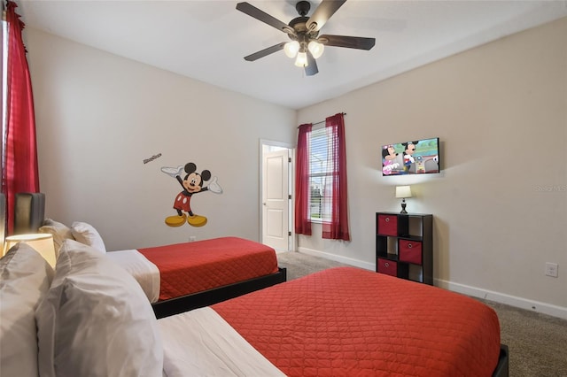 8942 Cabot Cliffs Dr, Davenport, FL 33896 - bedroom with carpet flooring and ceiling fan