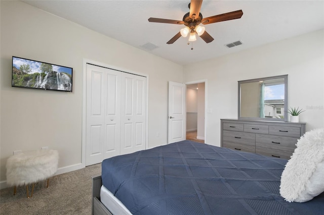 8942 Cabot Cliffs Dr, Davenport, FL 33896 - bedroom with carpet, a closet, and ceiling fan