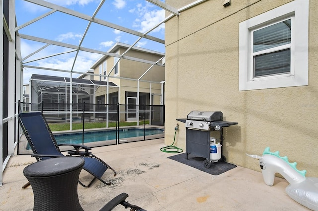 exterior space featuring a lanai, area for grilling, and a patio area