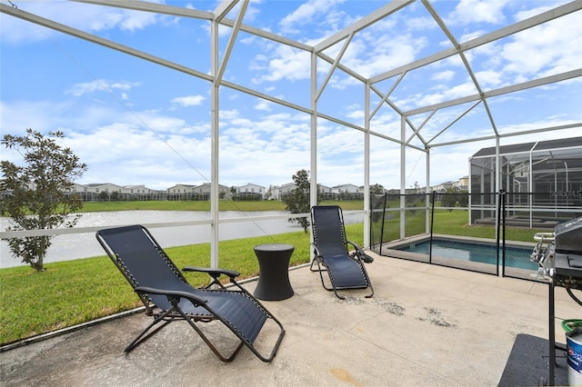 8942 Cabot Cliffs Dr, Davenport, FL 33896 - view of patio / terrace featuring an outdoor pool, a residential view, a lanai, and a water view