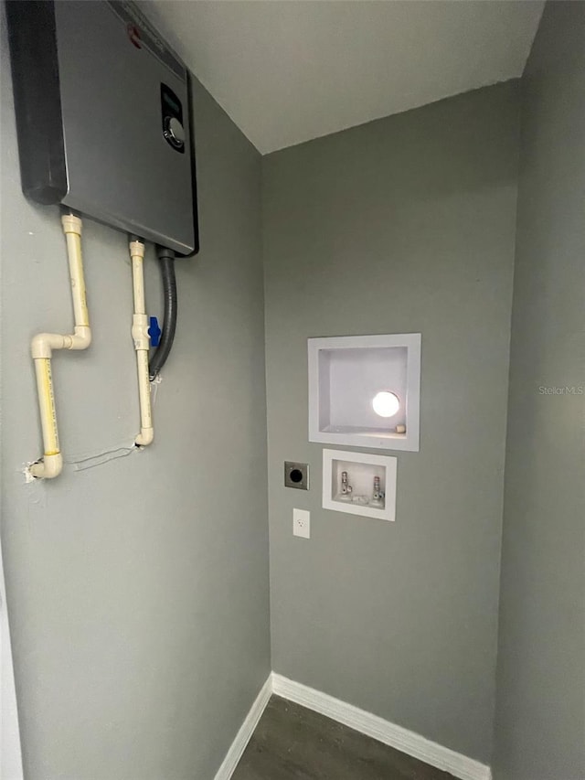 washroom with hookup for an electric dryer and hookup for a washing machine