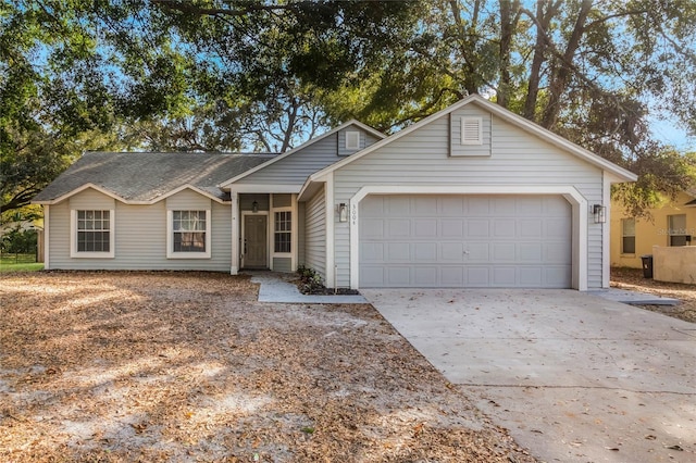 single story home featuring a garage