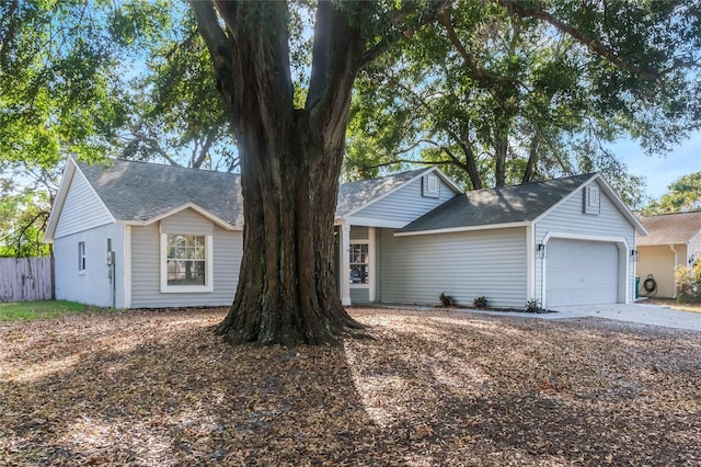 ranch-style home with a garage