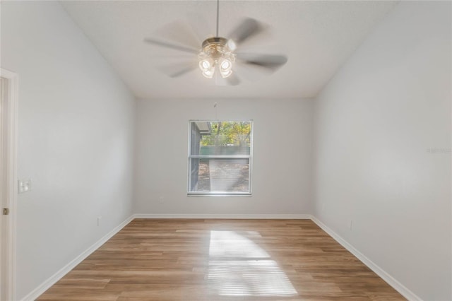 unfurnished room featuring light hardwood / wood-style floors and ceiling fan