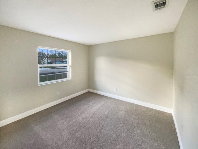 unfurnished room with carpet floors