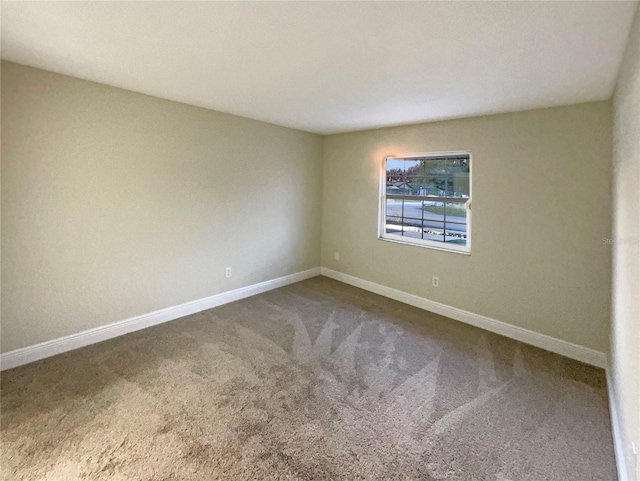 view of carpeted spare room