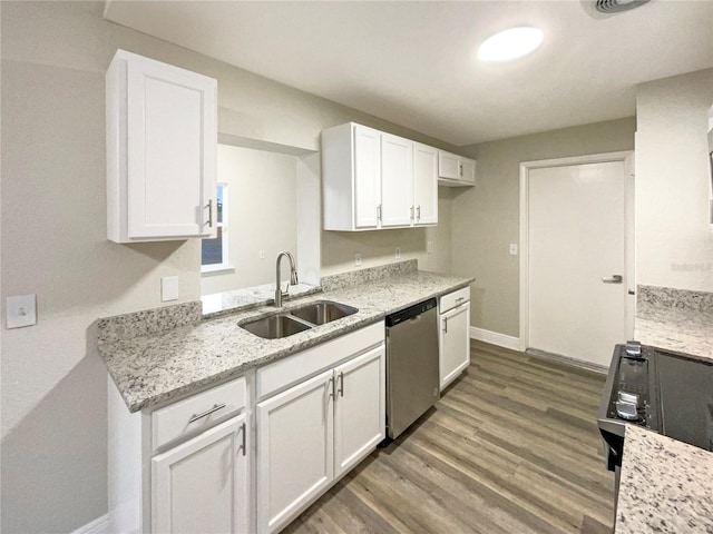 kitchen featuring dishwasher, dark wood-type flooring, white cabinets, sink, and light stone countertops