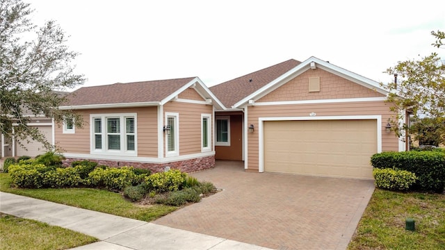 view of front of home with a garage