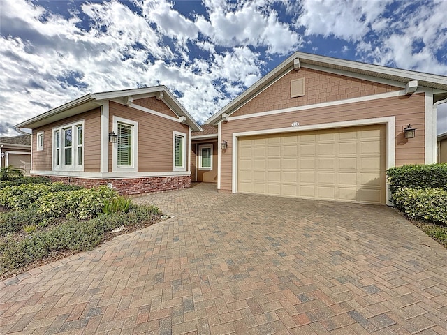 view of front of property with a garage