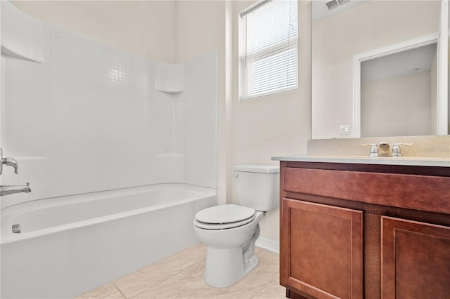 full bathroom featuring toilet, vanity, tile patterned floors, and washtub / shower combination