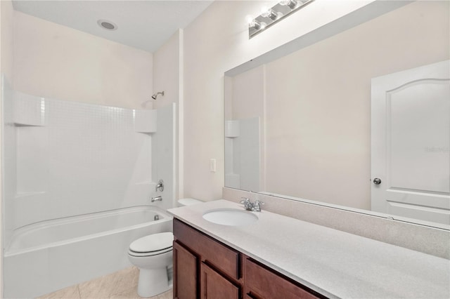 full bathroom featuring vanity, tile patterned floors,  shower combination, and toilet