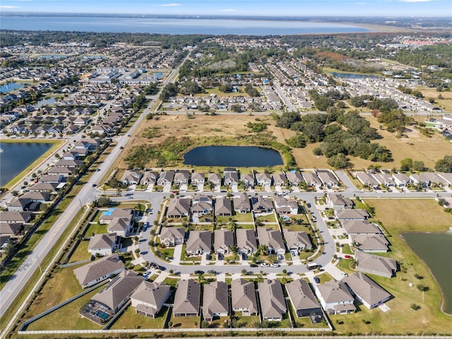 bird's eye view with a water view