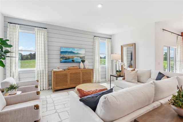 living room featuring wooden walls