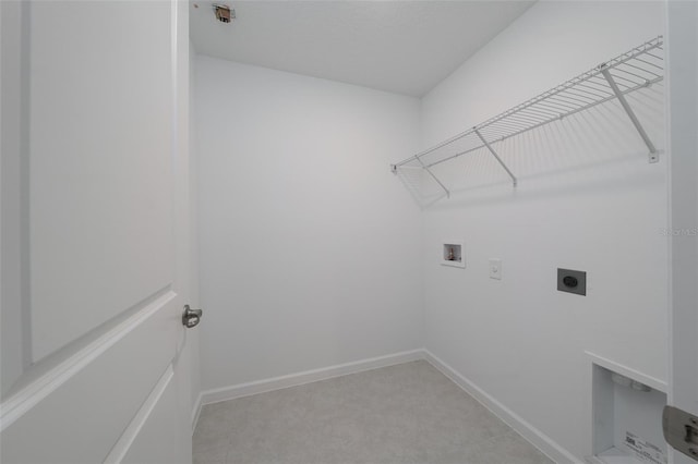 laundry room featuring hookup for an electric dryer, washer hookup, and light colored carpet