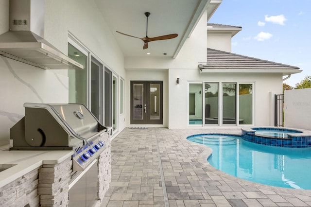 back of property featuring ceiling fan, a swimming pool with hot tub, a patio, and french doors